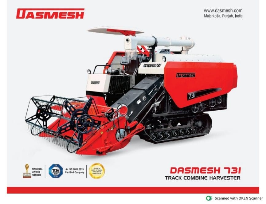 Combine harvester cutting a wheat crop in Uttar Pradesh